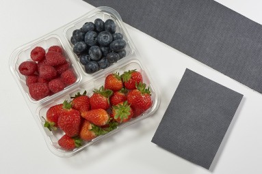  A packaging tray from Elliot Absorbant Products filled with strawberries, raspberries and blueberries